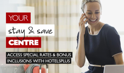 Your stay & save centre. Access special rates & bonus inclusions with Hotelsplus. Woman on phone and laptop in a hotel